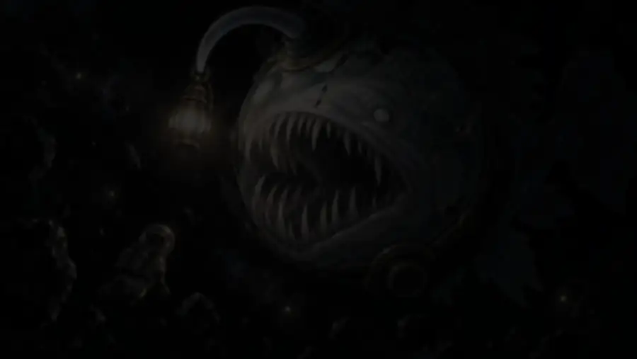 A shape in near-total darkness, too dark to make out.
